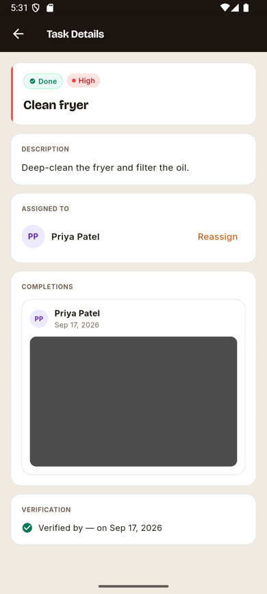 Task detail screen after verification, showing Verified by and the date
